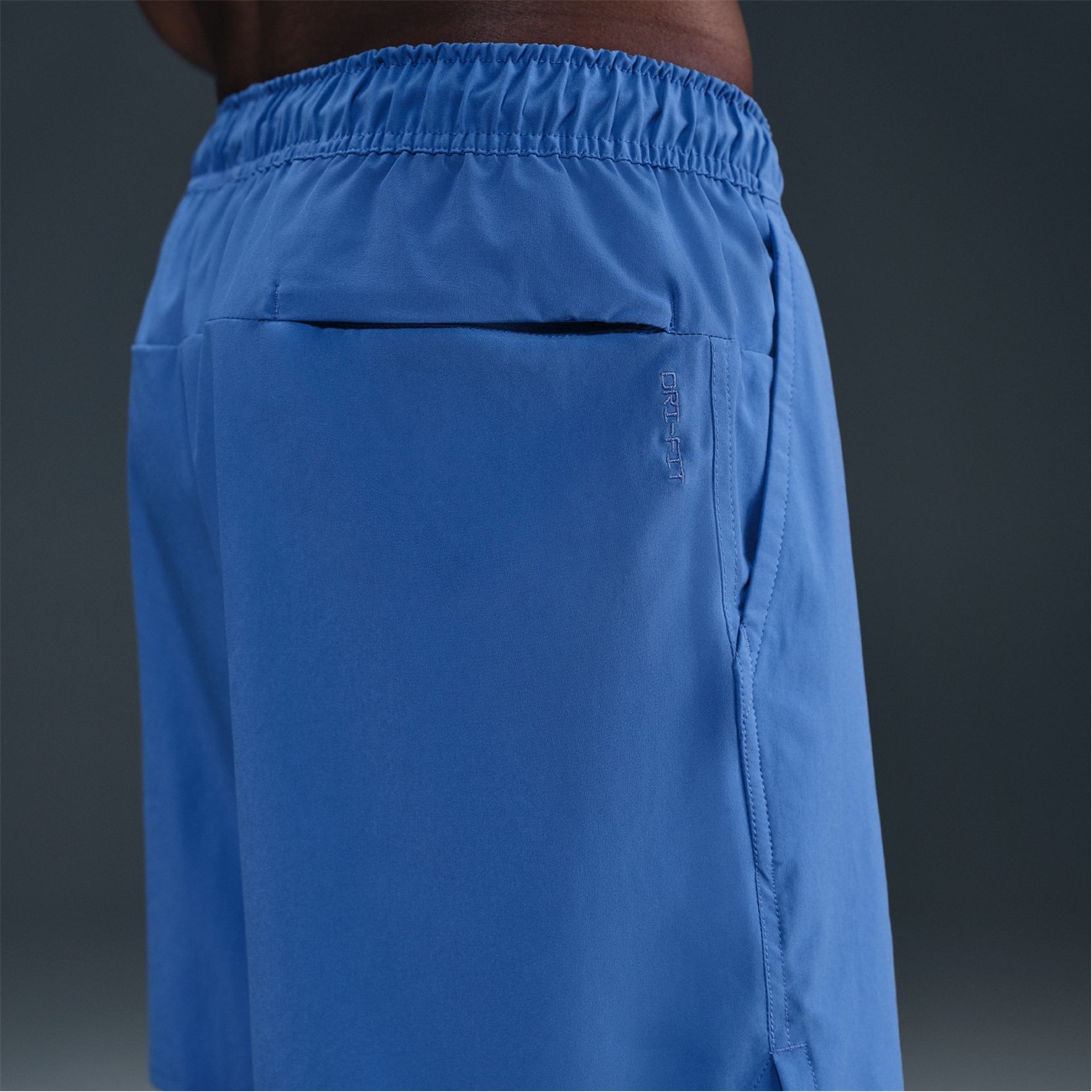 Kraťasy Nike Comet Blue 9980855 Dri-FIT Unlimited Men's 7 Unlined Woven Fitness Shorts - 9