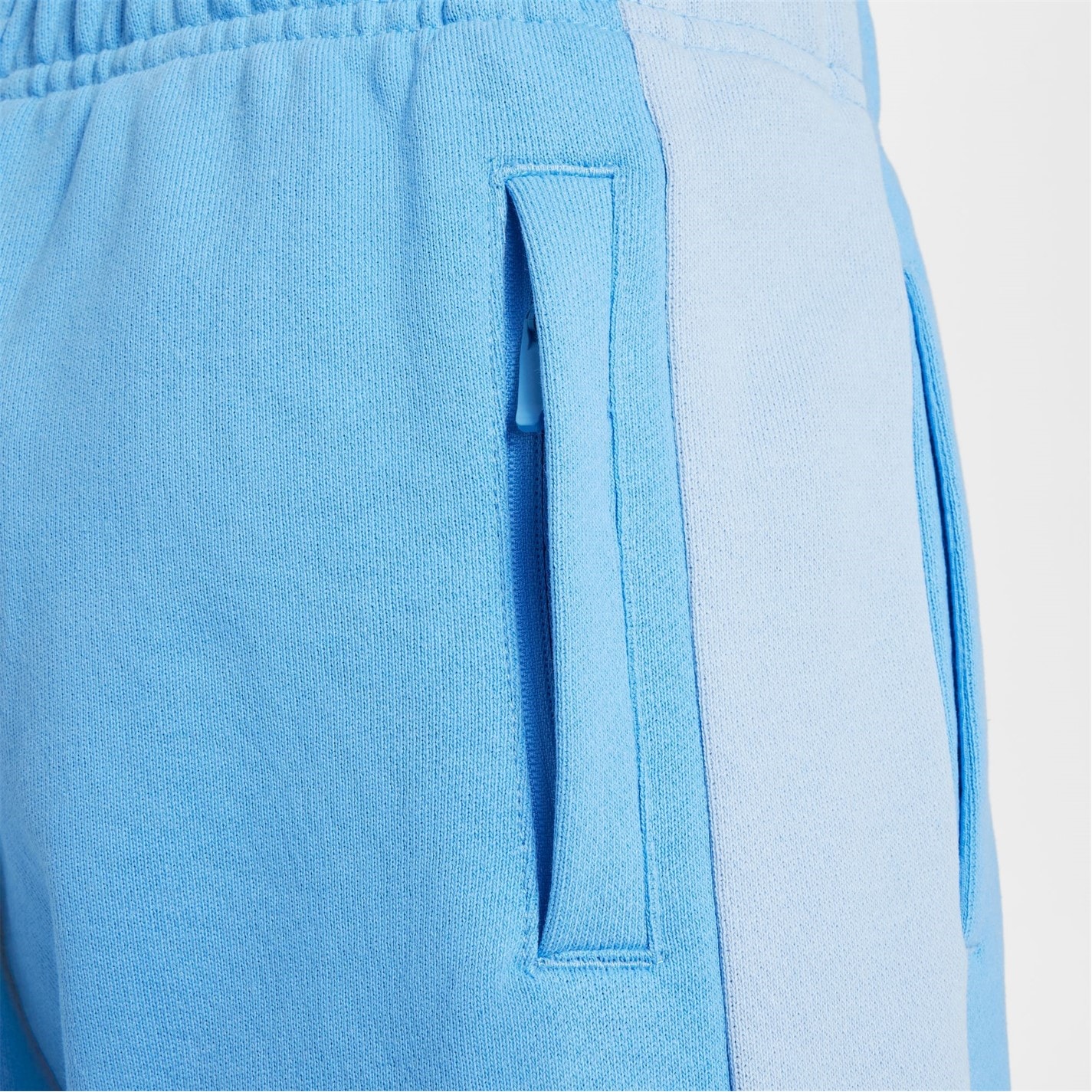 Dětské tepláky Nike University Blue 7562207 Unisex Kids' Closed Hem Fleece Joggers - 9