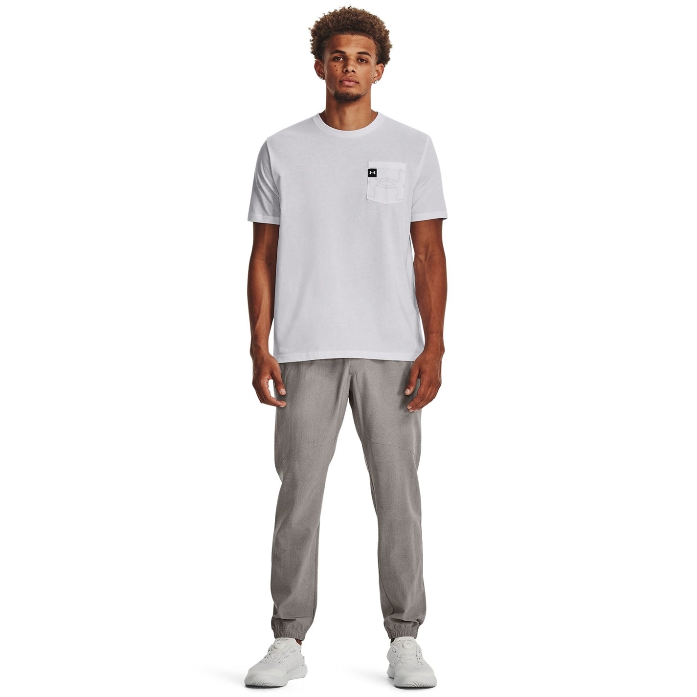 Tepláky Under Armour Grey 4519769 Men's Stretch Printed Closed Hem Woven Joggers - 4