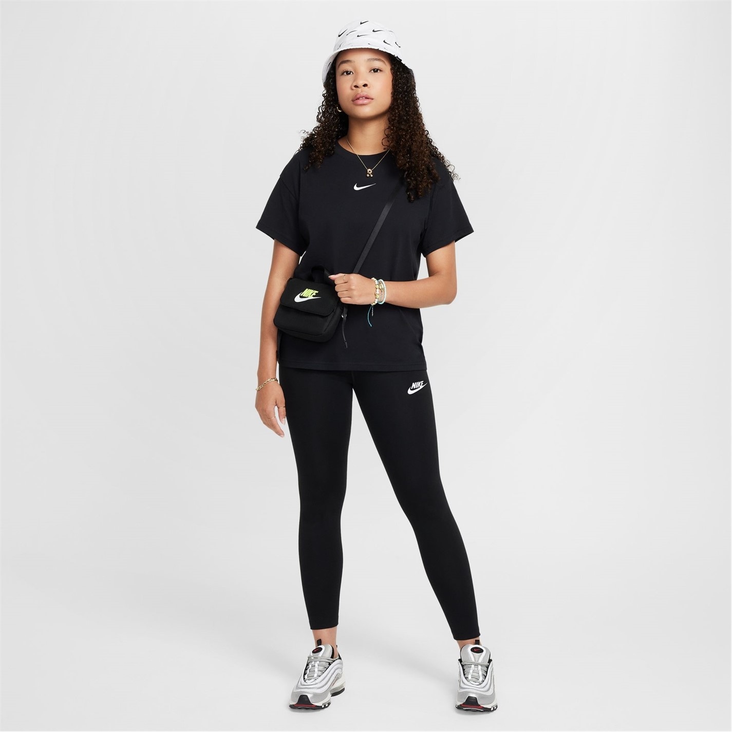 Nike Sportswear Essential Big Kids' (Girls') Mid-Rise Leggings - 4